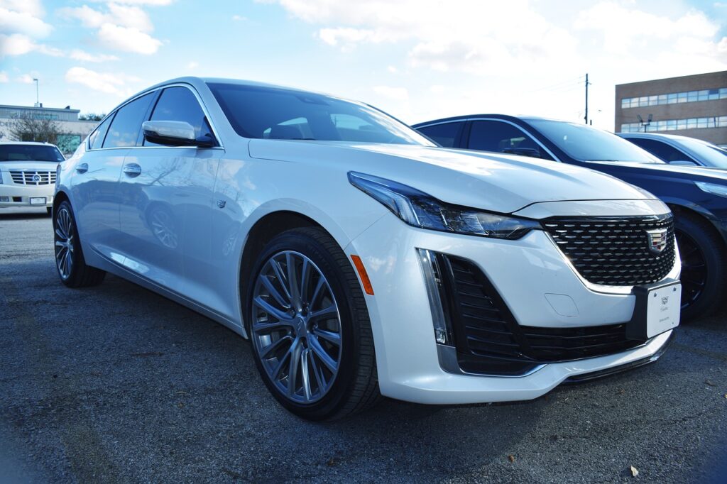 cadillac, cars, sales, retail, sedan, suv, cts, dealer, escalade, bronco, crystler, chevy impala, toyota landcruiser, 4-door sedan, custom cars, customized, low rider, design, top cars of 2021, white, pearl, headlamp, grill, 22 inch rims, tinted windows, cadillac, cadillac, cadillac, cadillac, cadillac, sedan, sedan, suv, suv, dealer, dealer, chevy impala, toyota landcruiser